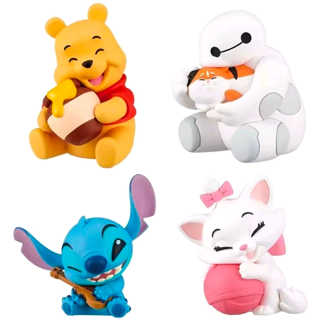 Four Disney plush characters shown together: Stitch, Winnie the Pooh, white robot, and Marie