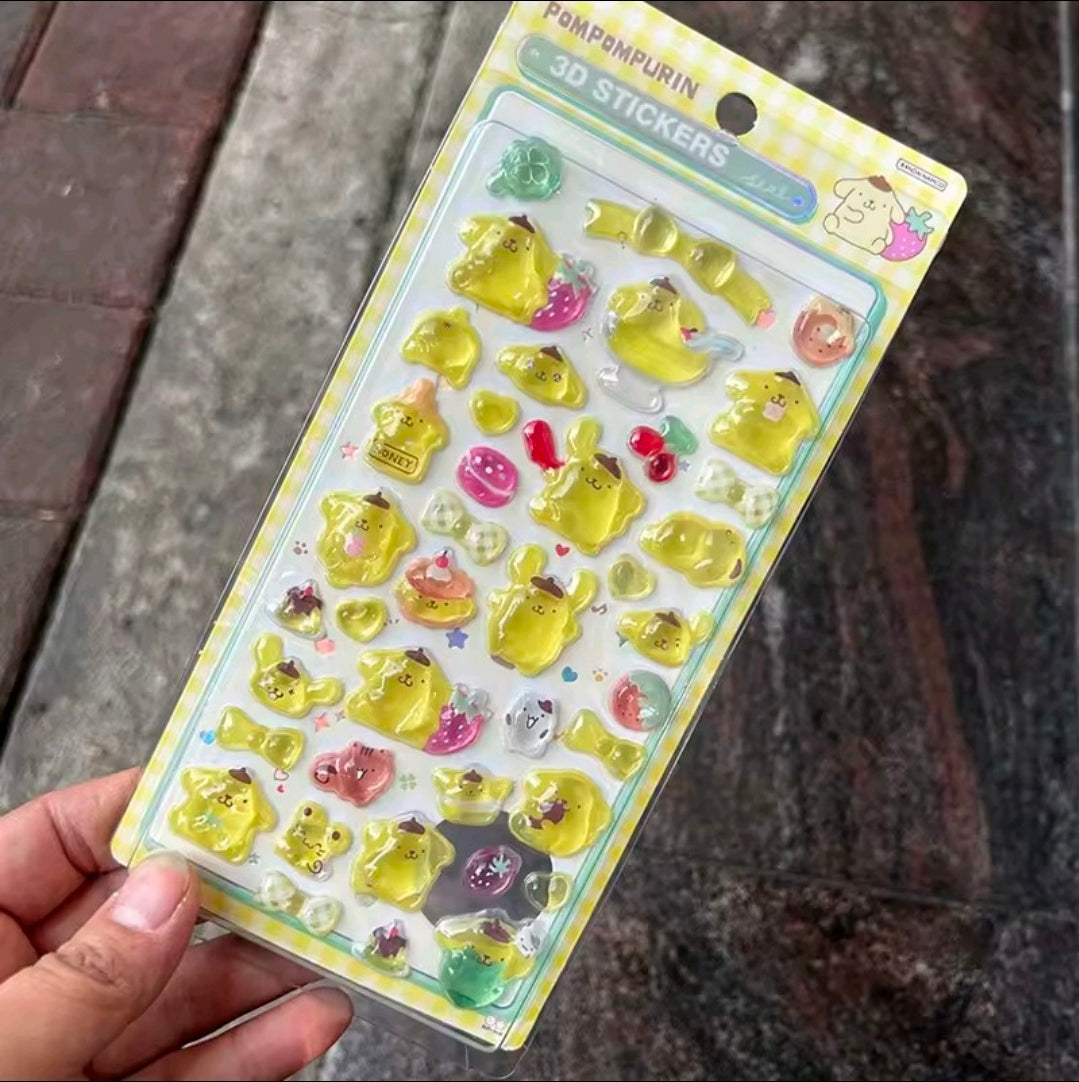 3D acrylic sticker set with yellow and green cute character charms on a card