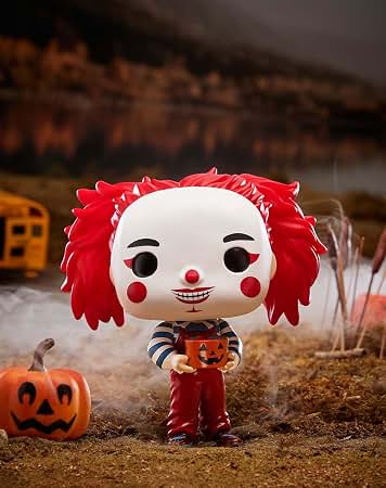 Chuckles Funko Pop! vinyl figure with red hair holding a jack-o-lantern on the ground