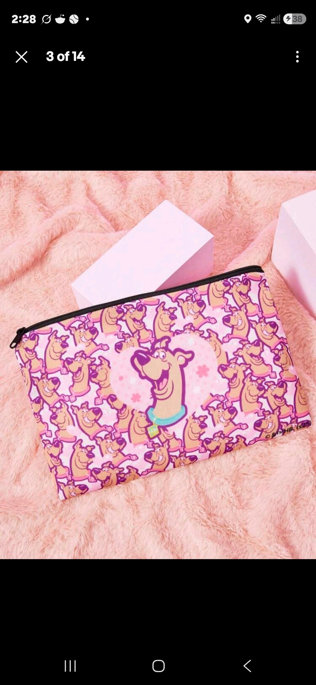 Pink Scooby-Doo makeup pouch with black zipper, shown at an angle