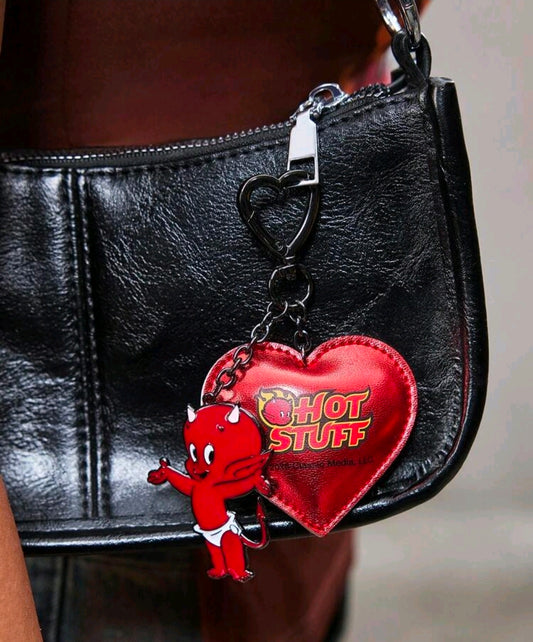Red faux leather heart keychain with 'Hot Stuff' logo and little devil charm