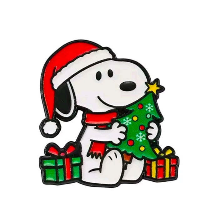 Snoopy Christmas enamel pin wearing Santa hat, hugging tree with gifts