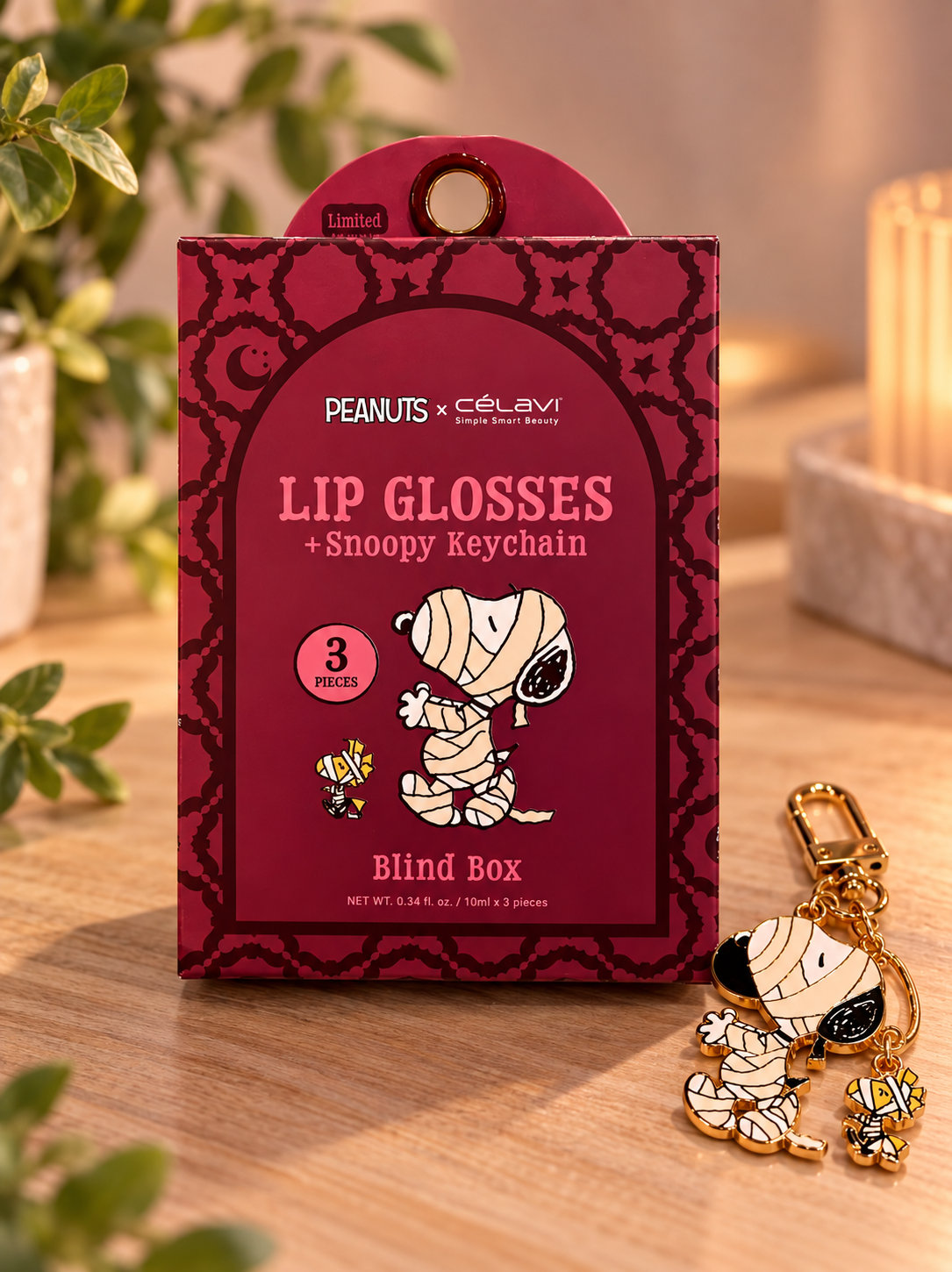 Lip glosses + Snoopy keychain blind box with gold Snoopy keychain charm