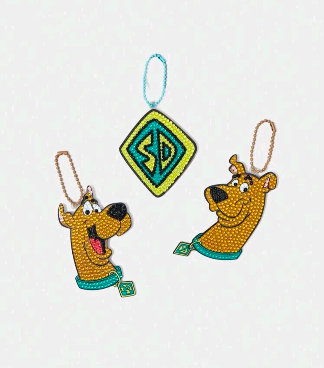 Diamond painting ornaments: two dog charms and one SD logo square with hanging cords
