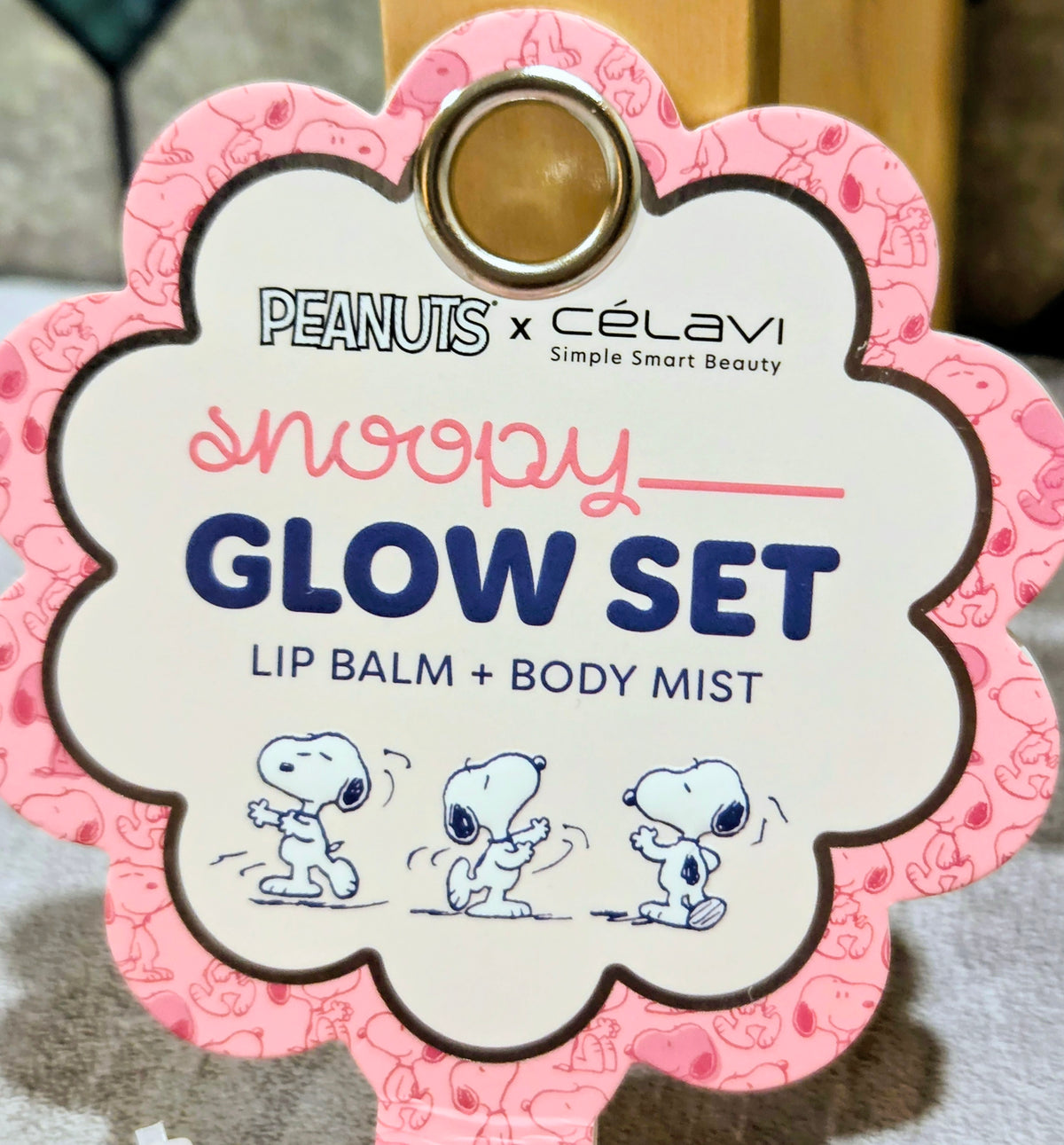 Peanuts x Célavi Snoopy Glow Set keychain with lip balm and body mist