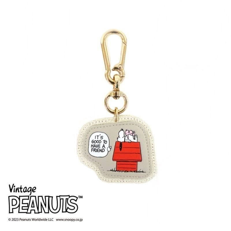 Fabric keychain fob with gold clasp, red doghouse graphic and speech bubble