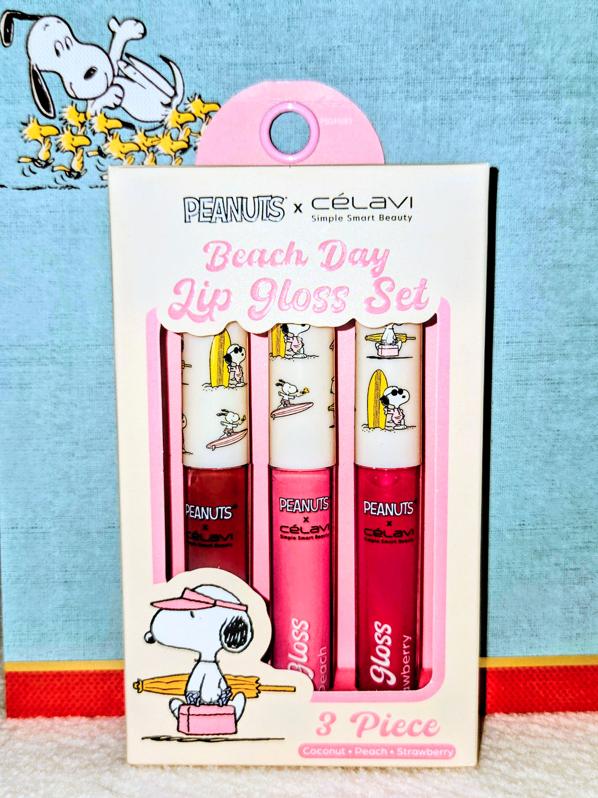 3-piece Beach Day lip gloss set box with Snoopy artwork and three gloss tubes inside
