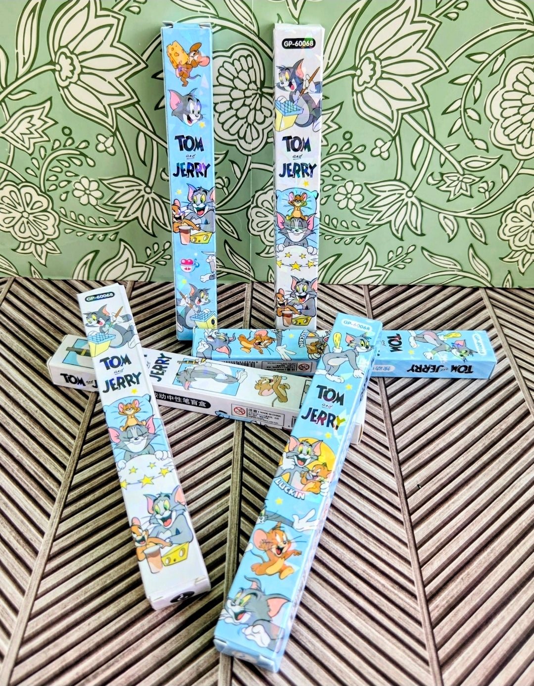 Tom & Jerry blind box gel pen set boxes with cartoon characters on a tray