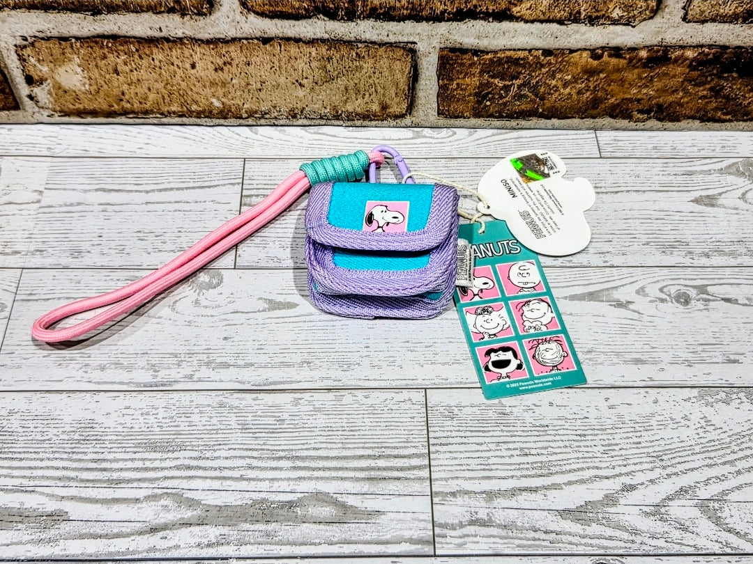 Canvas earbud case with wrist strap, teal and purple, carabiner and Peanuts tags