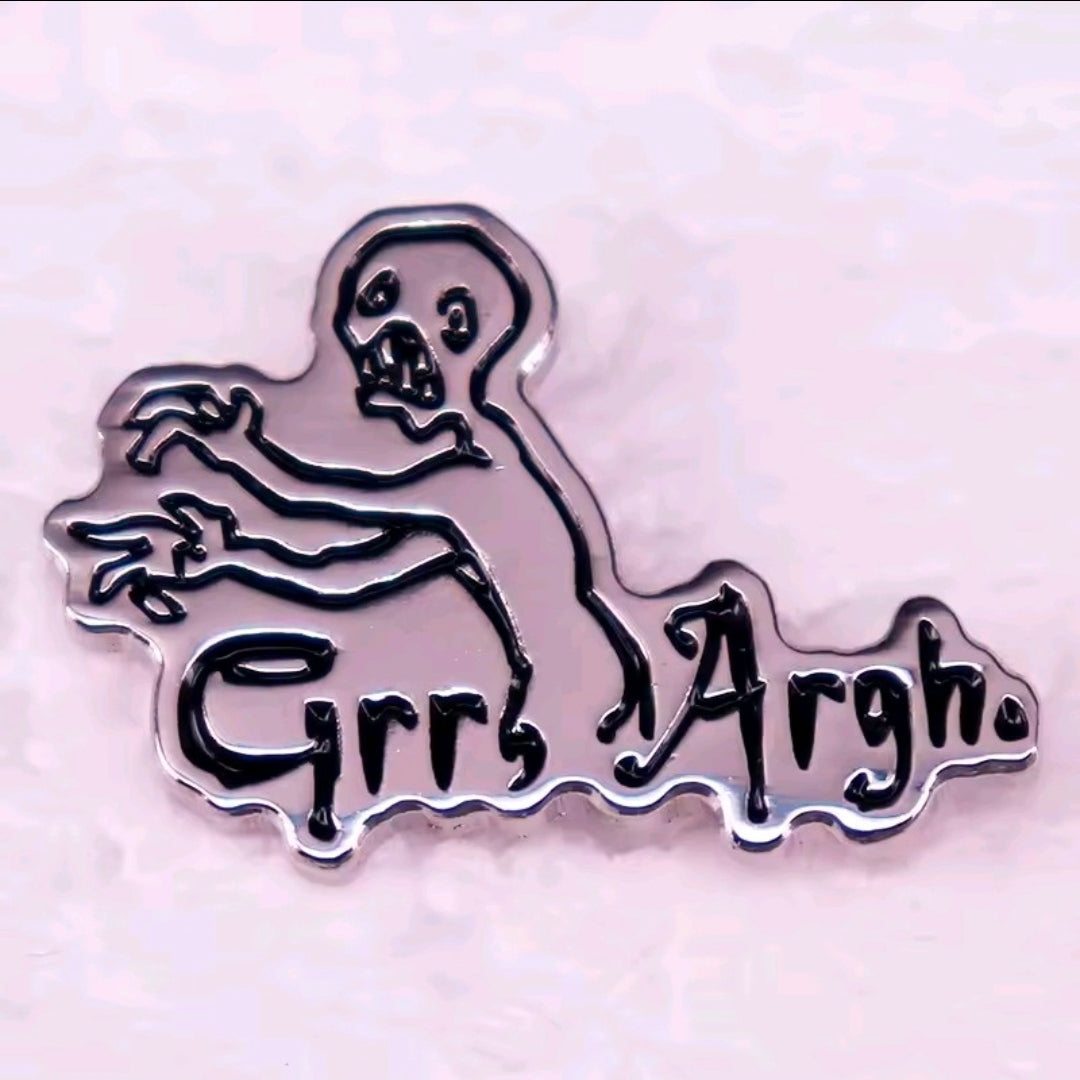 Grr Argh enamel lapel pin featuring vampire slayer figure and “Grr Argh” lettering