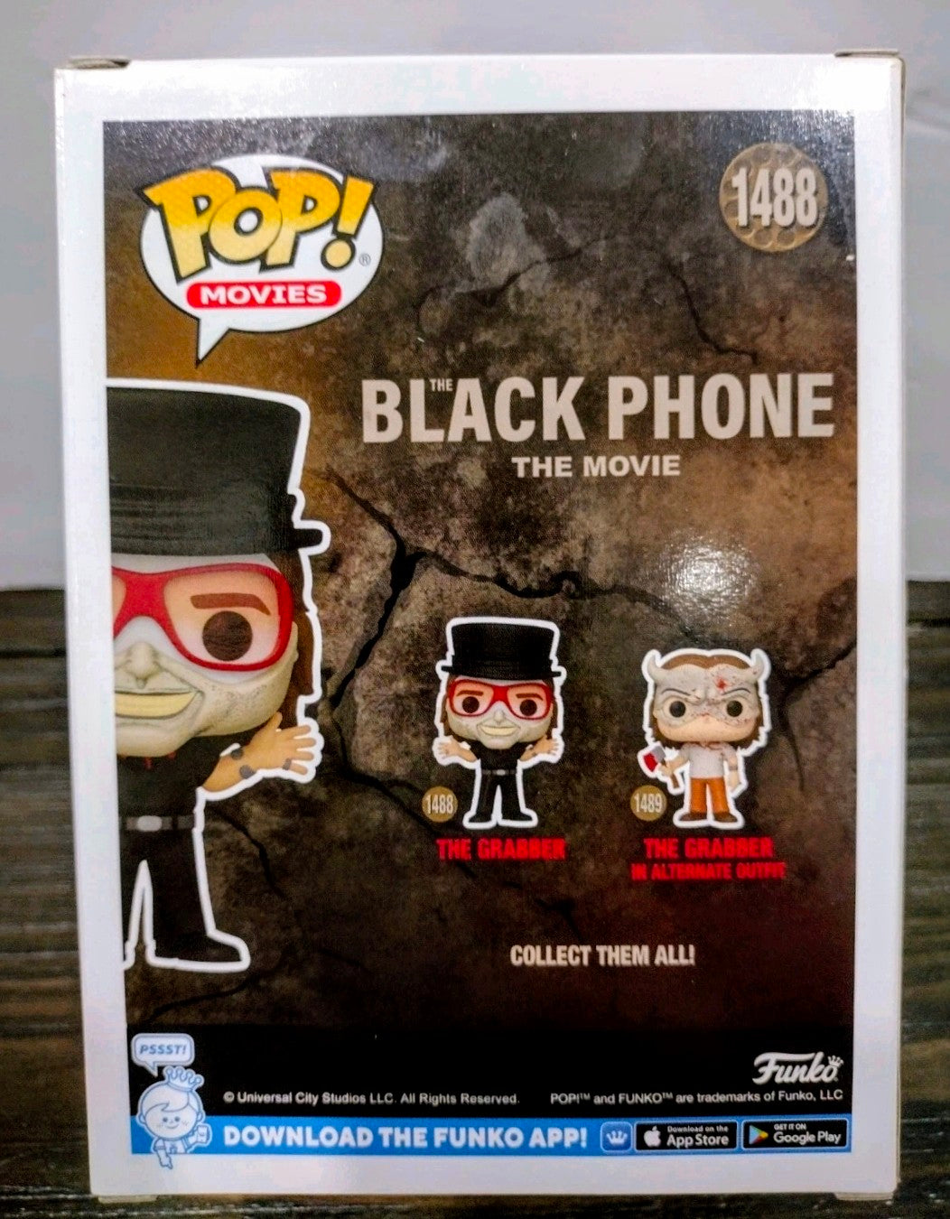 Funko Pop Movies vinyl figure box with The Grabber character and lineup