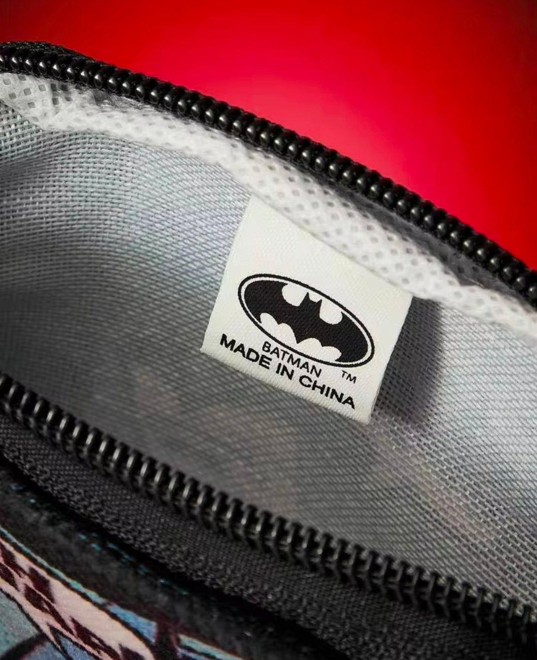 Batman zip pouch interior lining with Batman logo and Made in China label