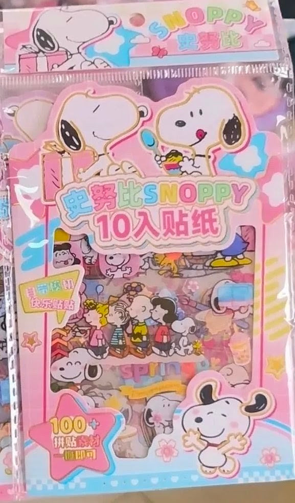 Kawaii PET sticker pack with Snoopy and friends on pink-and-blue front