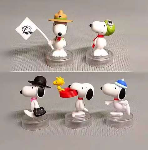 Five Snoopy mini figures with different outfits, each on a clear round display base