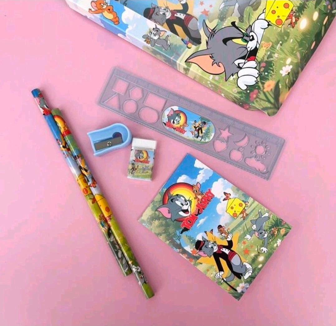 Tom & Jerry stationery gift set with pencil, eraser, notepad, and ruler laid out