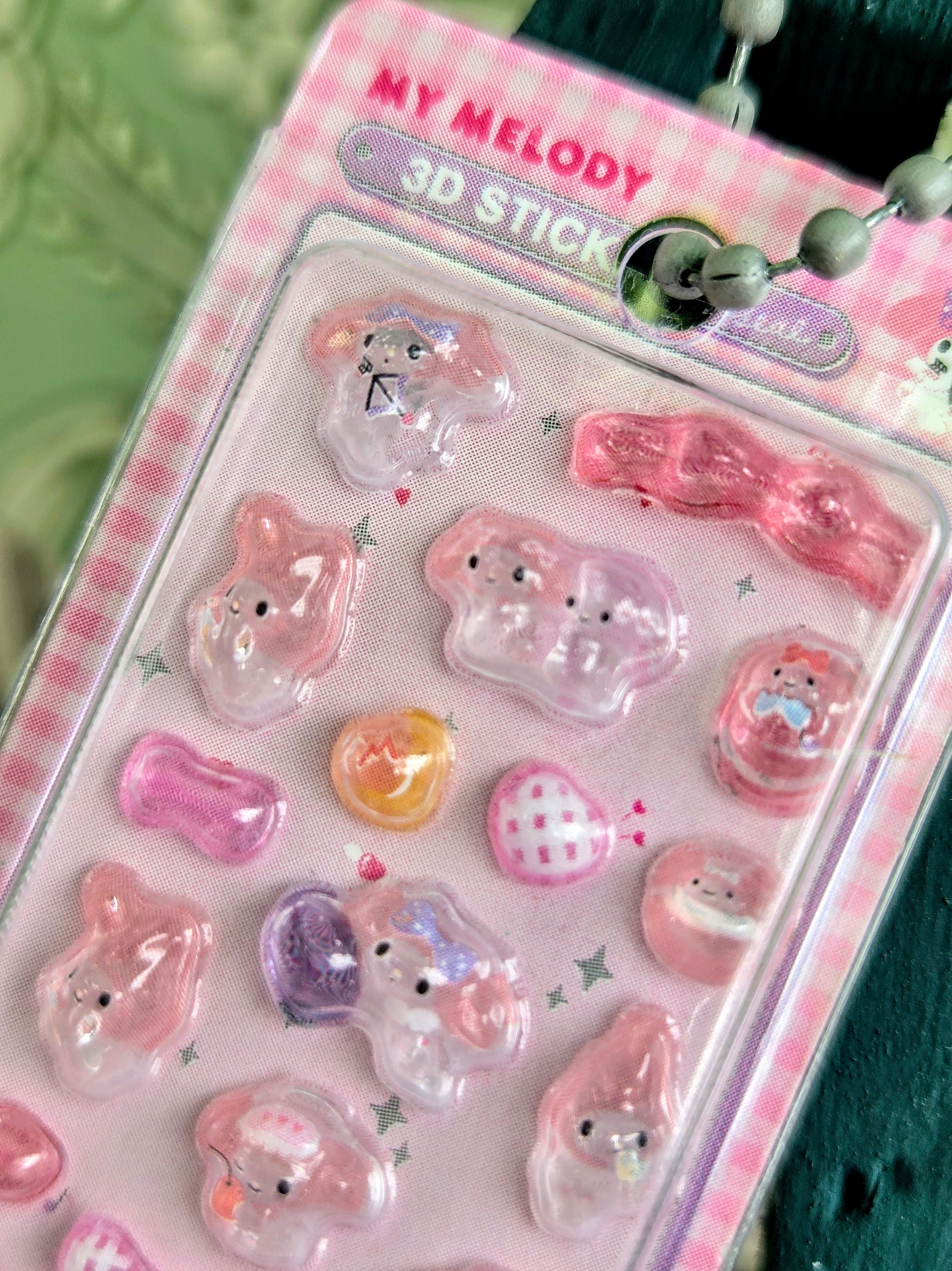 Pink-themed 3D character sticker set in a clear blister with keychain tag at top