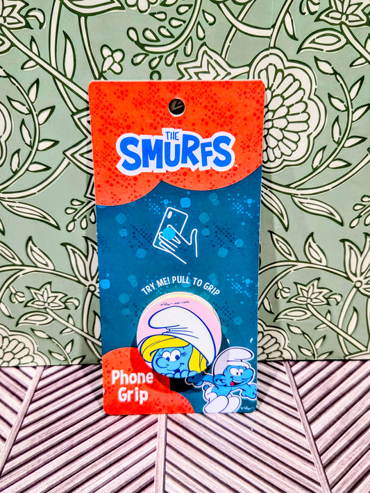 Smurf phone grip holder on blue packaging with The Smurfs logo and try me graphic