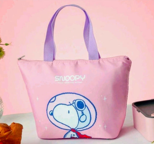 Pink insulated lunch bag with purple handles and blue Snoopy graphic on front