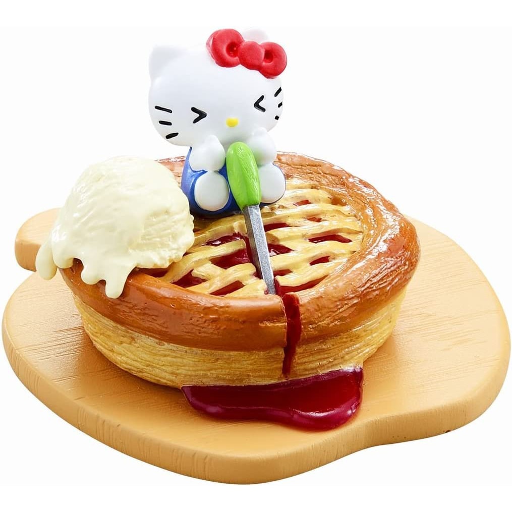 Hello Kitty apple pie figure with white cream and red jam, mini collectible on a wooden tray