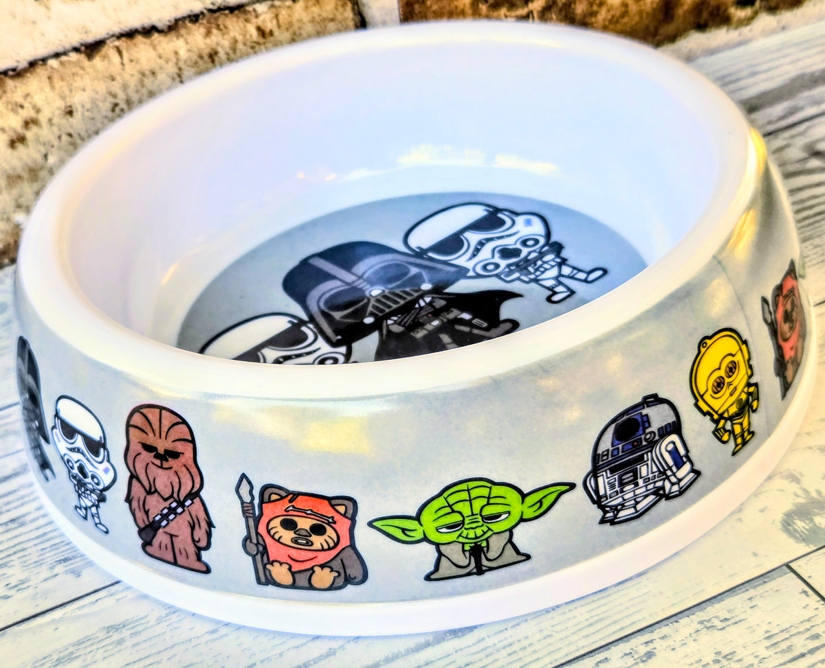 Star Wars pet bowl with illustrated character graphics around the rim