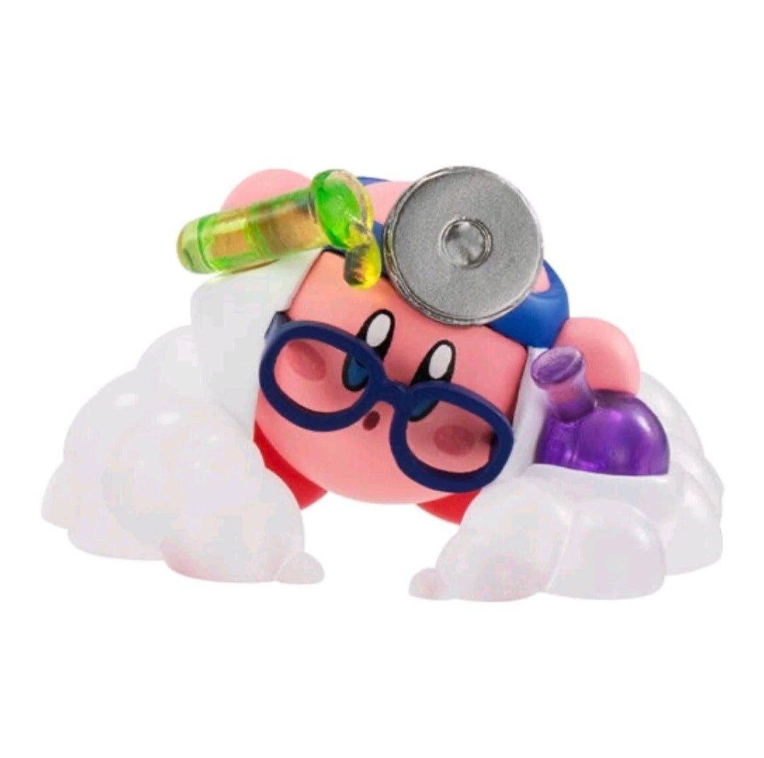 Kirby gashapon figure with green bottle accessory, dark goggles, and white cloud base