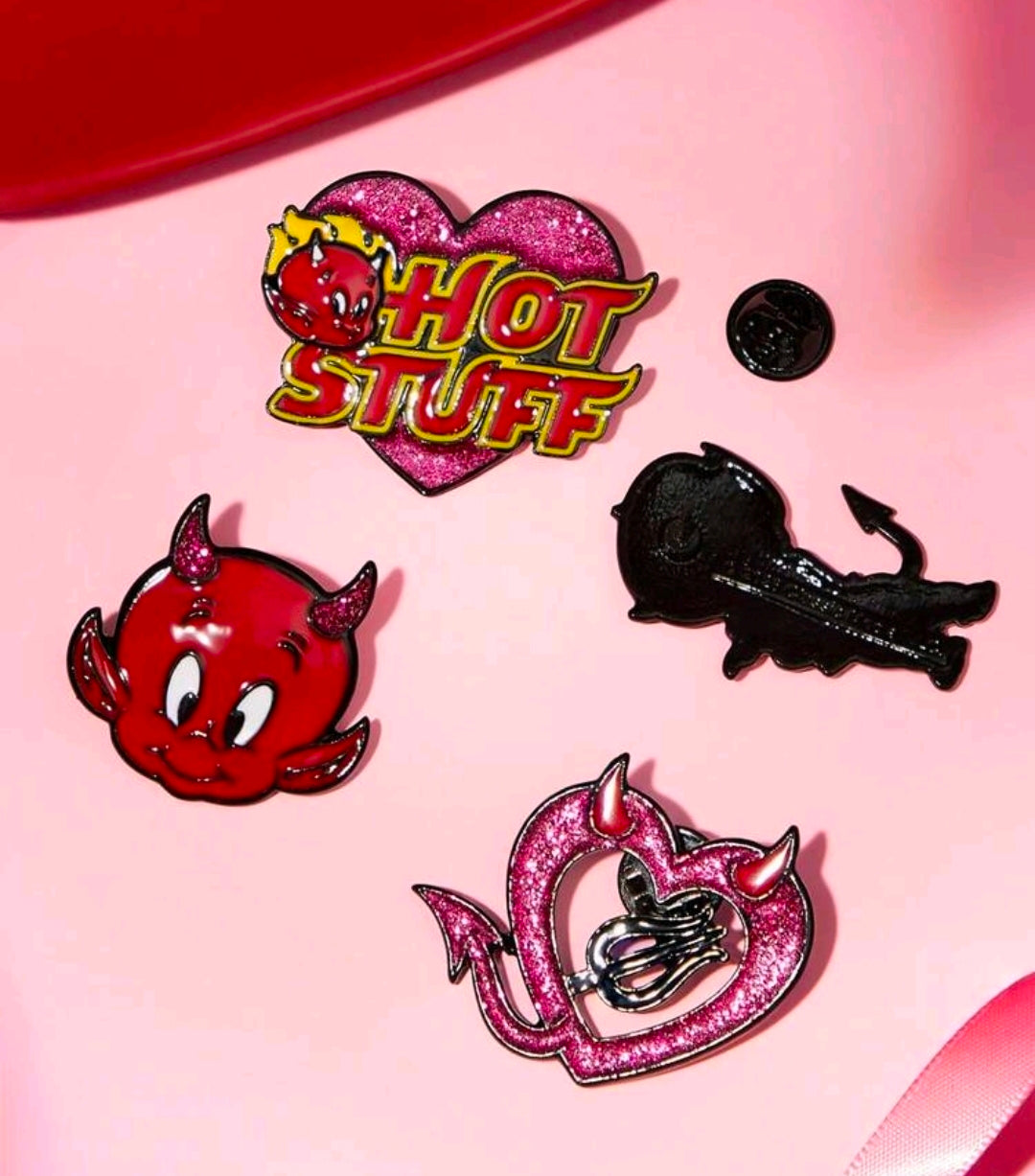 Four enamel pins: pink glitter heart 'Hot Stuff' plus red devil and dark devil silhouette
