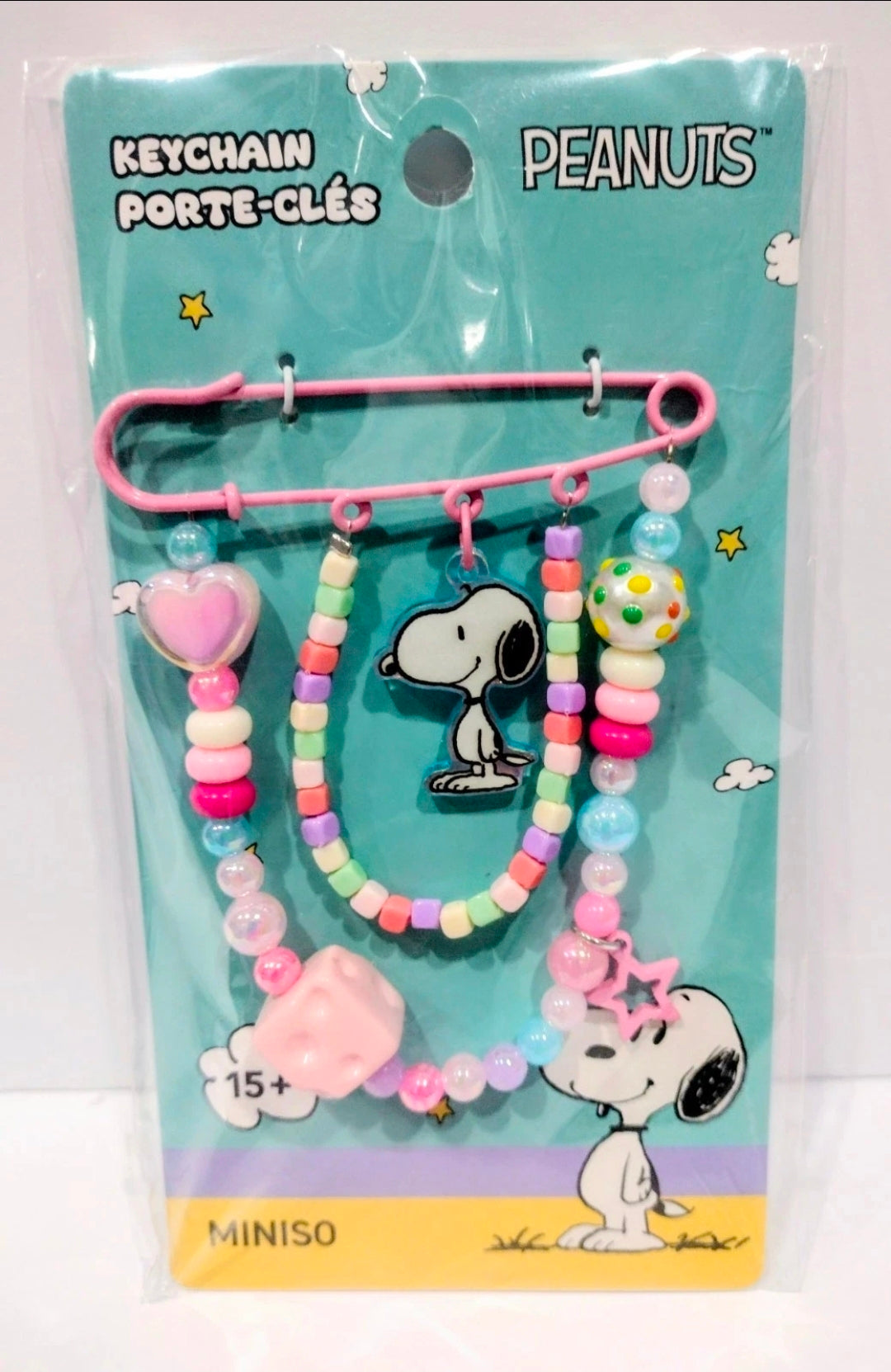 Snoopy beaded safety pin keychain on card with pink and pastel beads, heart and star charms