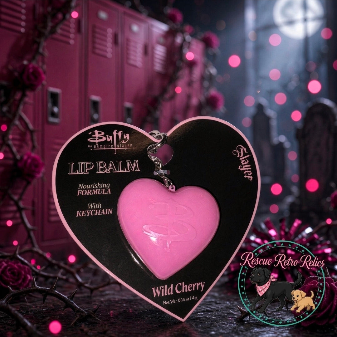 Heart lip balm keychain and pink nail polish bottle duo displayed in a retail set.