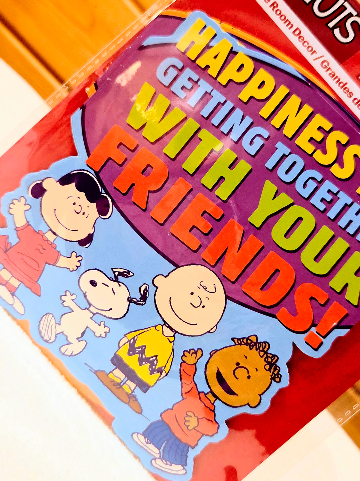 Peanuts wall decor card set with Snoopy and kids, bold 'Happiness is...' text