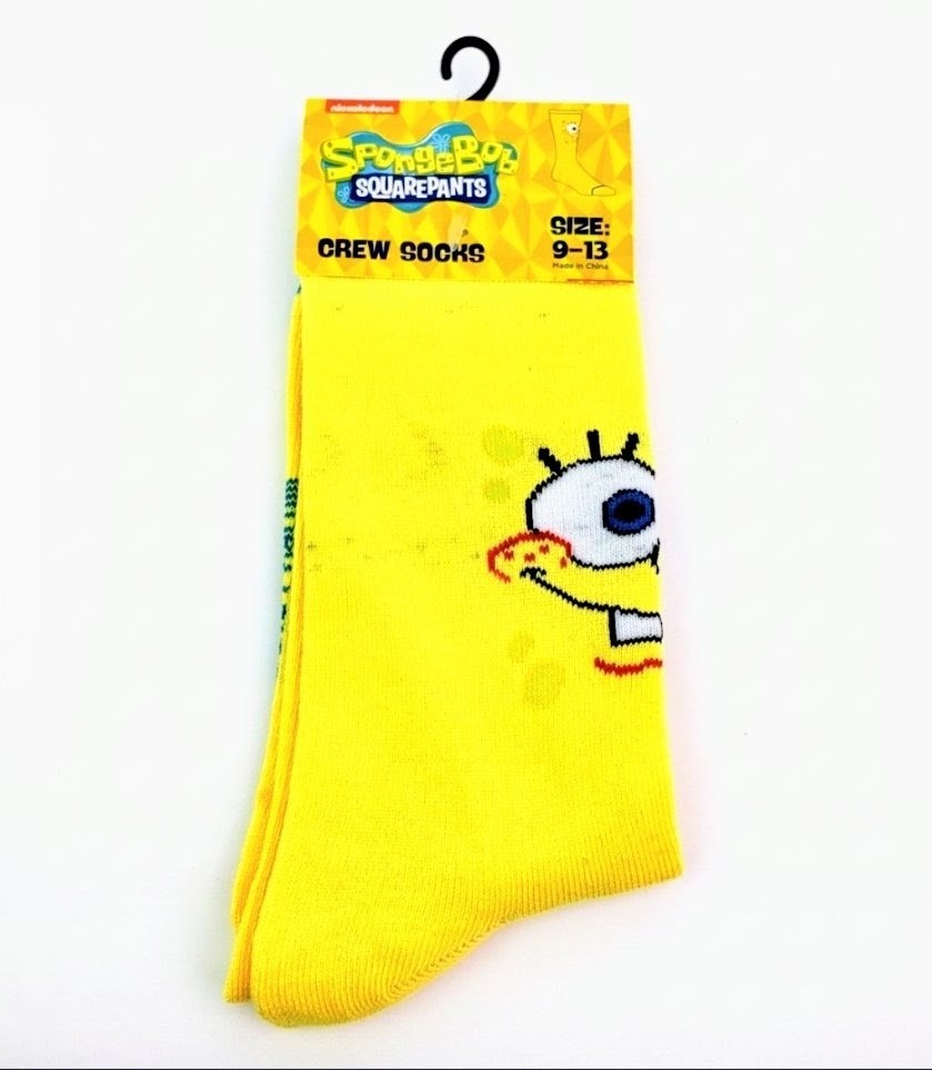Yellow crew socks featuring SpongeBob SquarePants character face and arm graphic