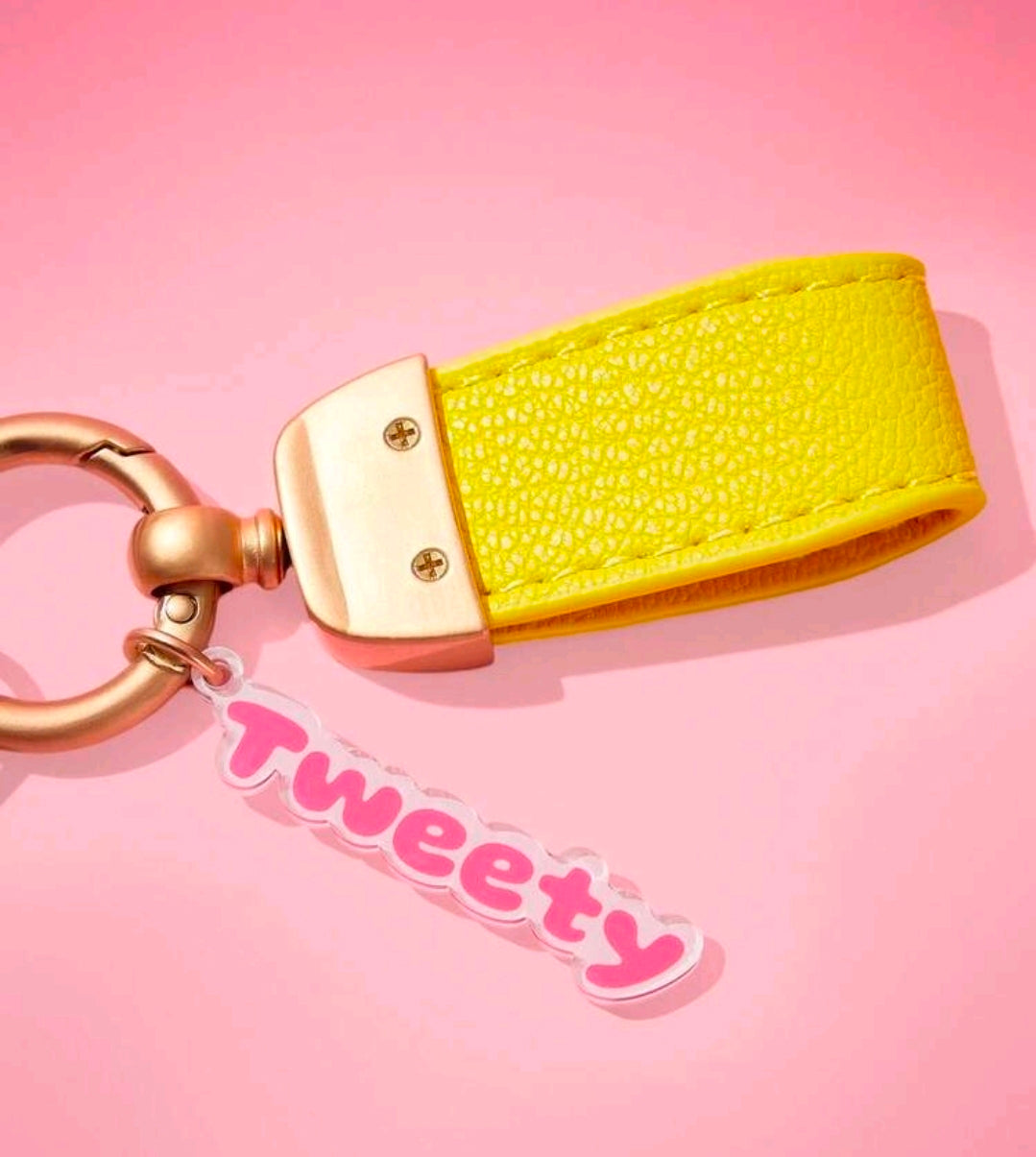 Yellow keychain with gold clasp and Tweety Bird face charm