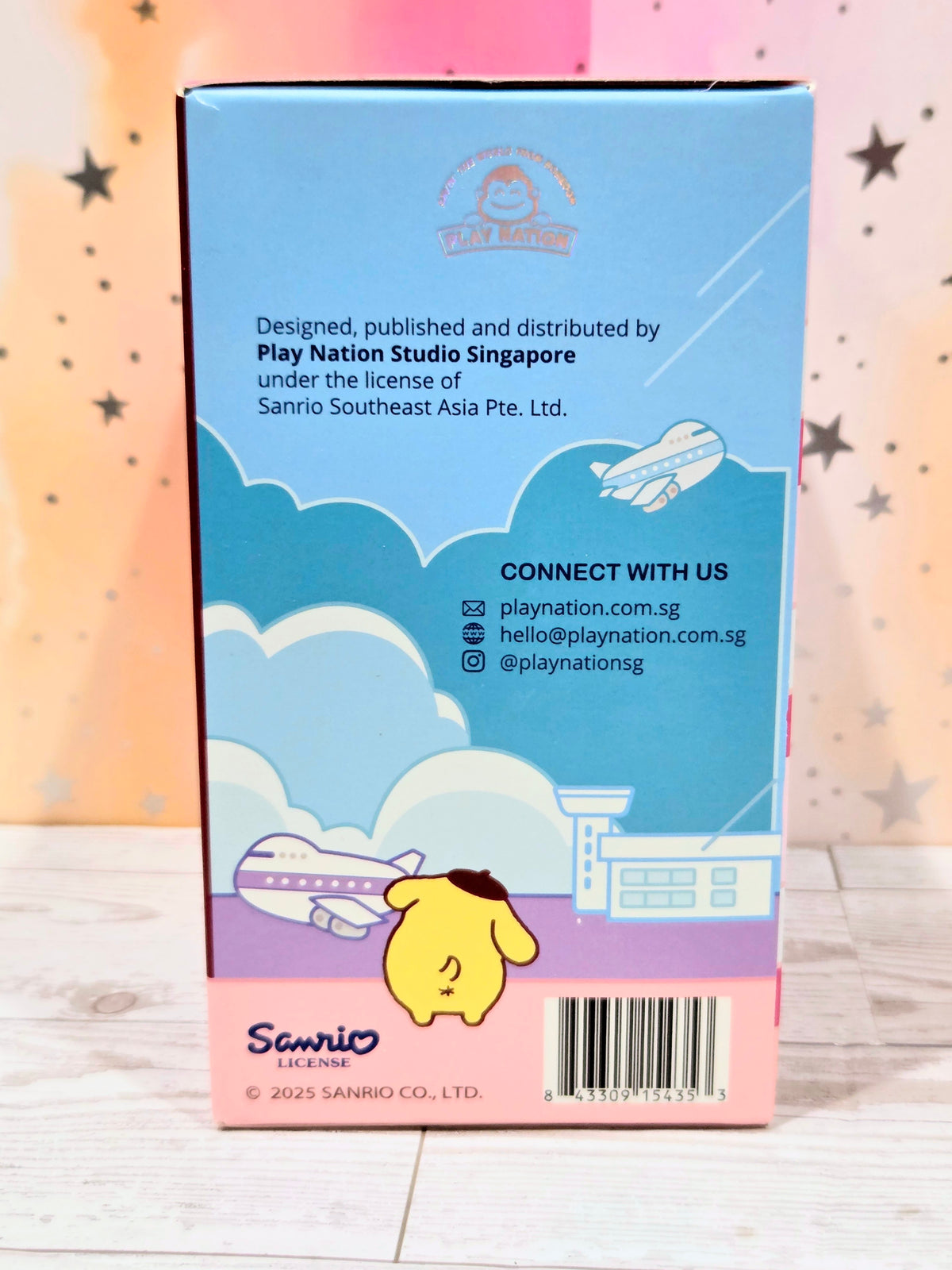 Cinnamoroll building block keychain set box back with connect-us info and clouds