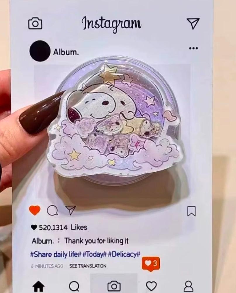 Acrylic glitter shaker phone grip with Snoopy in purple cloud scene, round bubble top
