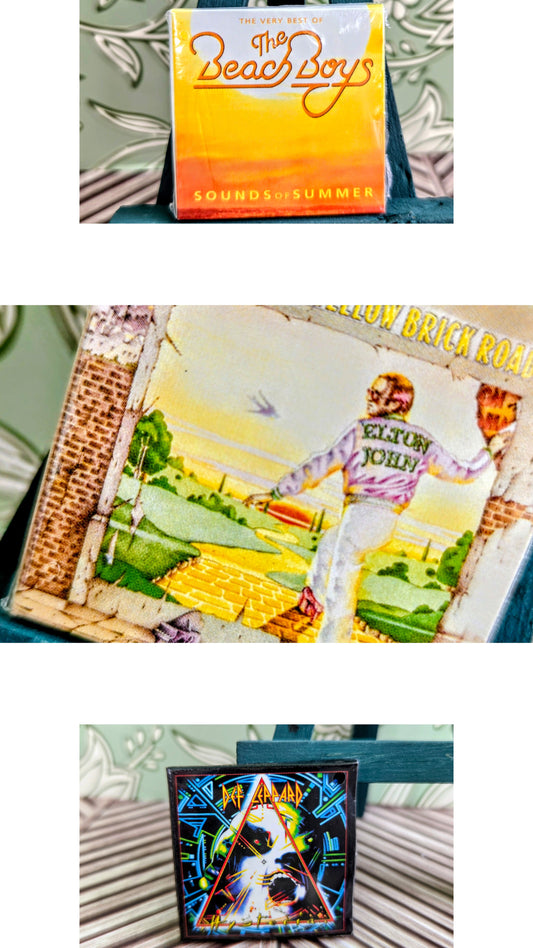 Assorted classic rock vinyl album sleeves: The Beach Boys, Elton John, Def Leppard
