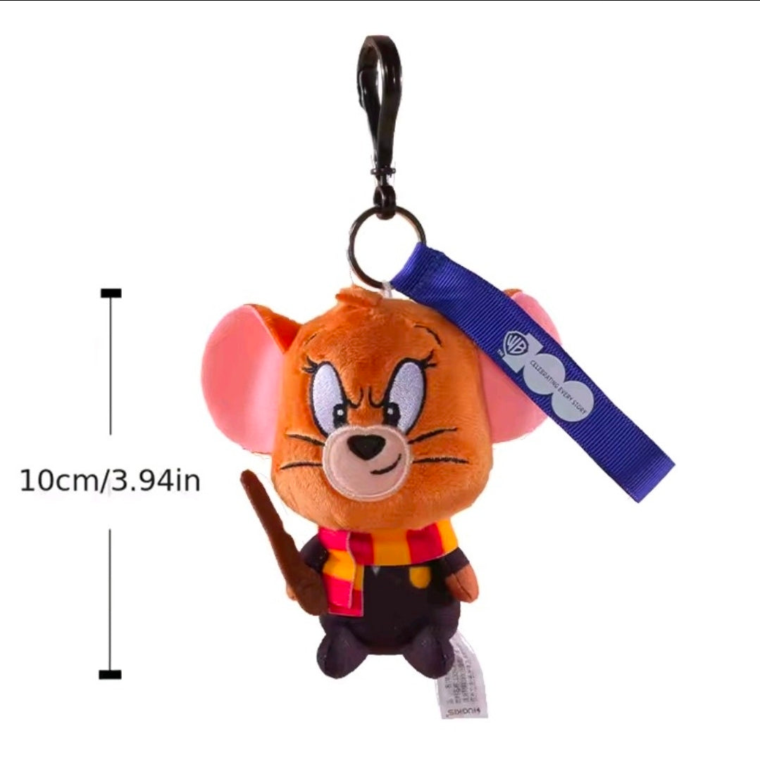 Orange wizard plush keychain with blue strap, wand, and metal hanging loop