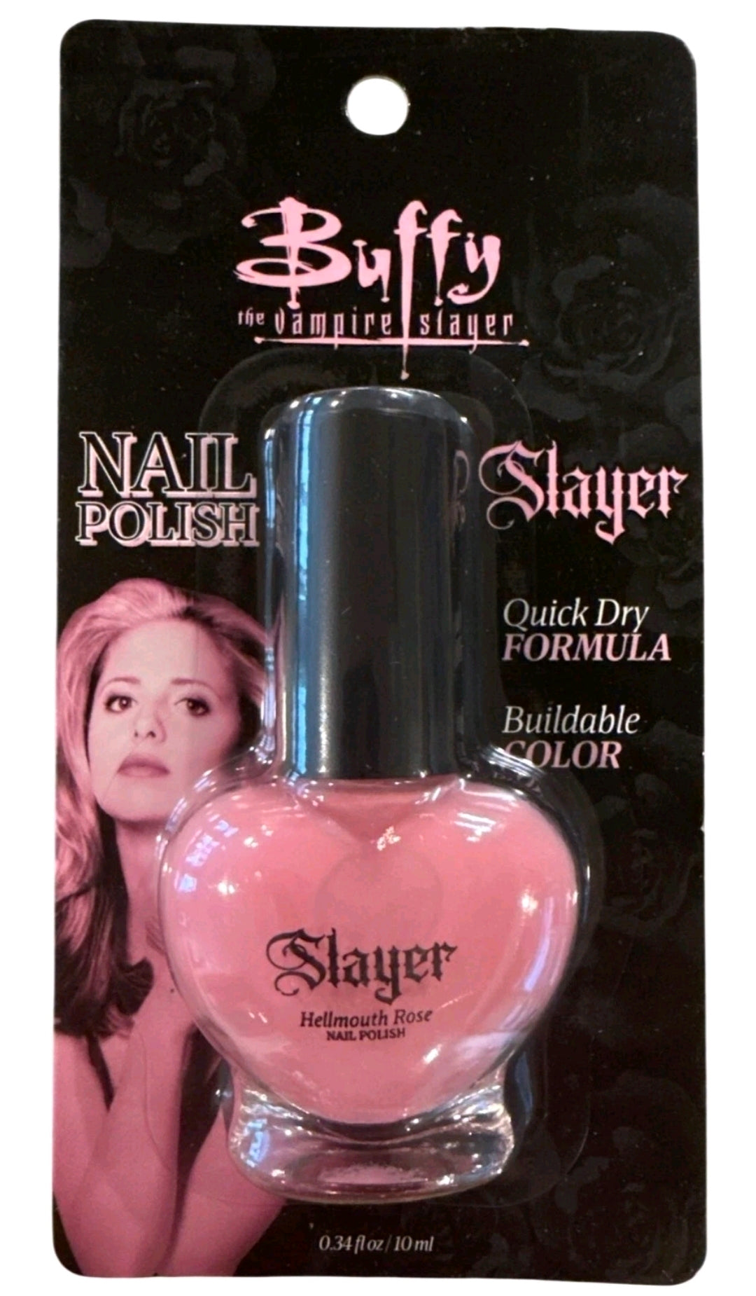 Pink Slayer nail polish bottle with black cap on Buffy Nail Polish card