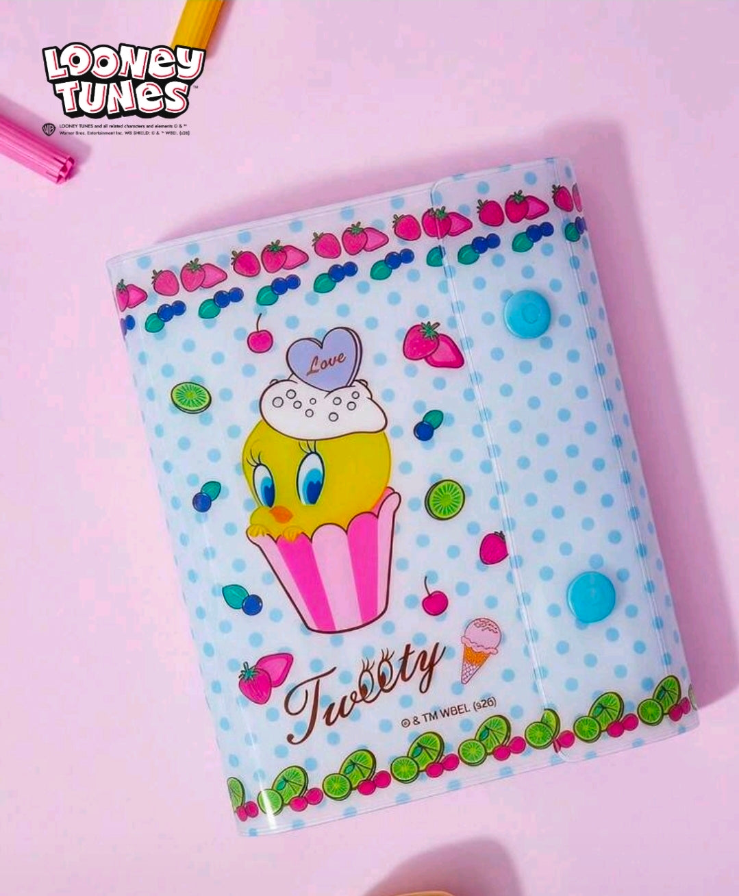 A7 6-ring planner sticker album with snap closures, close-up blue dotted Tweety cupcake front