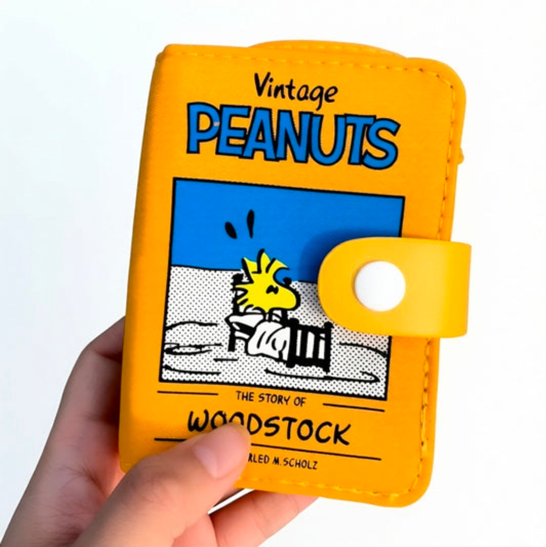 Peanuts Snoopy Woodstock vintage book multi-pouch, orange zip wallet with snap strap and front art