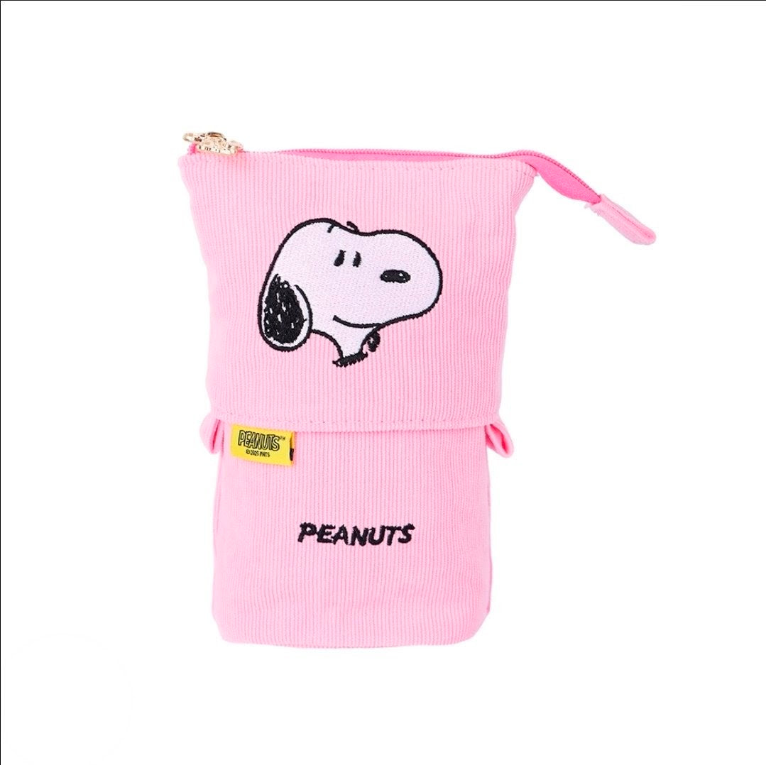 Pink corduroy pop-up pencil case with Snoopy face and PEANUTS text, standing.