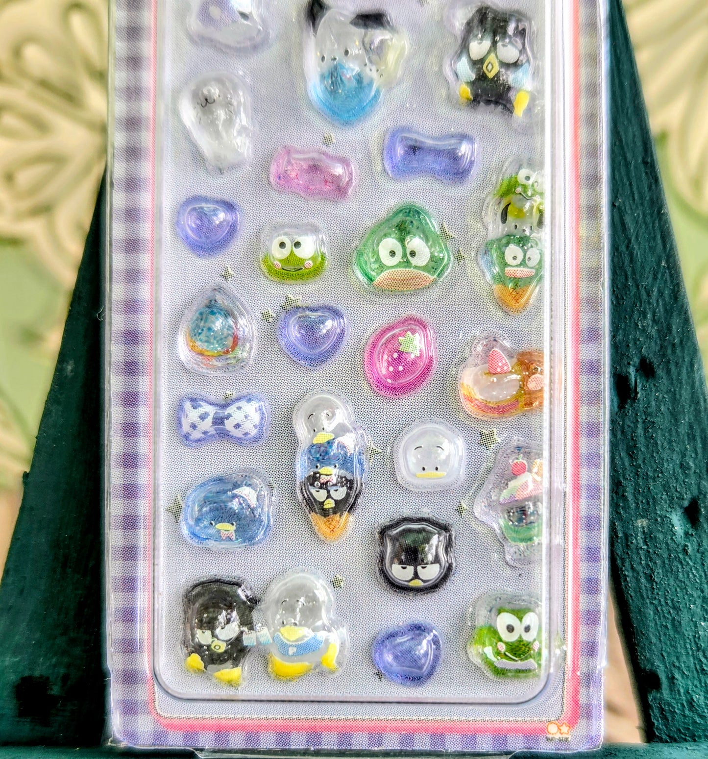 3D sticker keychain set card in clear blister with blue, purple, pink, and silver charms.