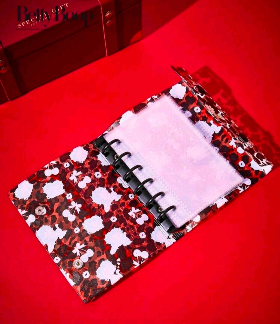 Betty Boop PVC ring binder open, showing white pages and patterned cover