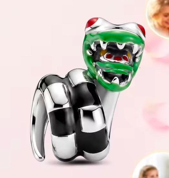 Sterling silver S925 sandworm charm with green head and red eyes, black enamel details