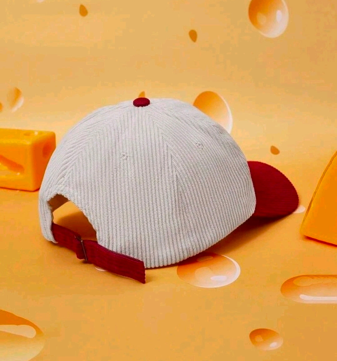 Light gray baseball cap with burgundy corduroy brim and small red top button