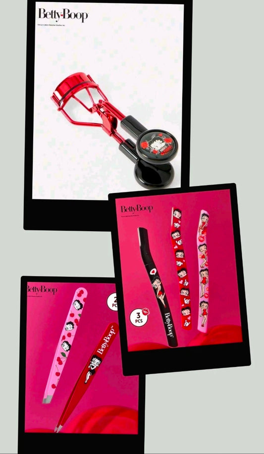 Betty Boop eyelash curler with red metal frame and black handle, cartoon face detail