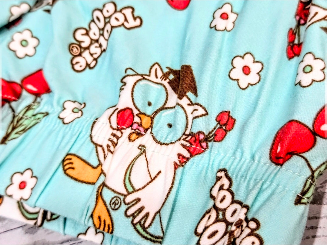 Mint sleep shorts with close-up cartoon character and heart flower print