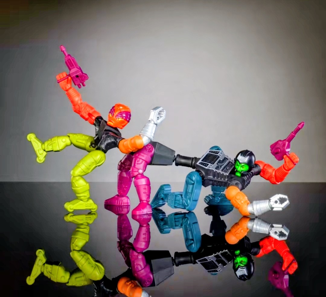 Modular evil horde action figure set with multicolor robot bodies and weapons