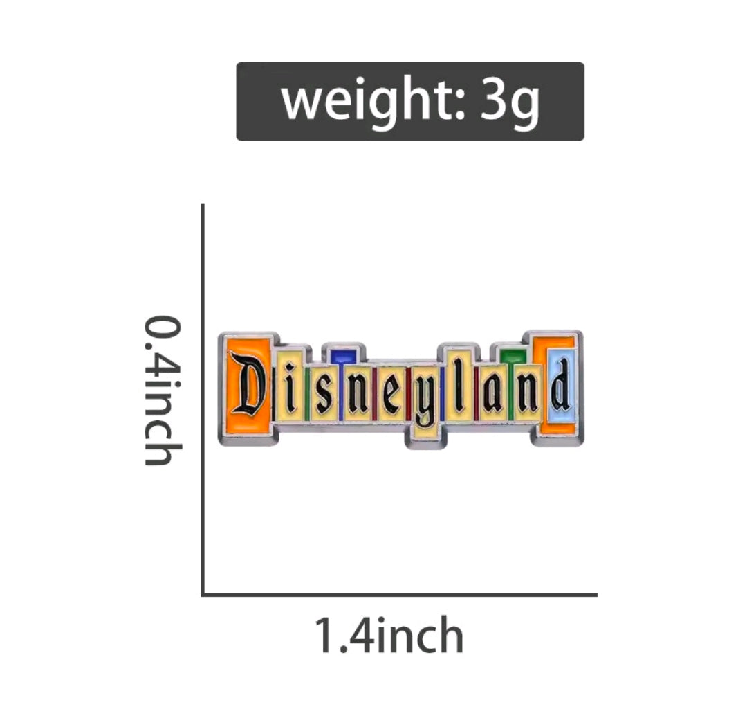 Disneyland enamel pin with colorful block-letter design